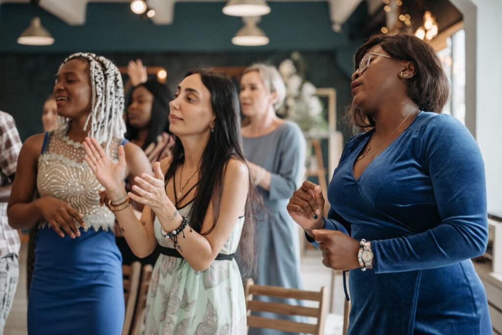 A Group of Women Singing Together