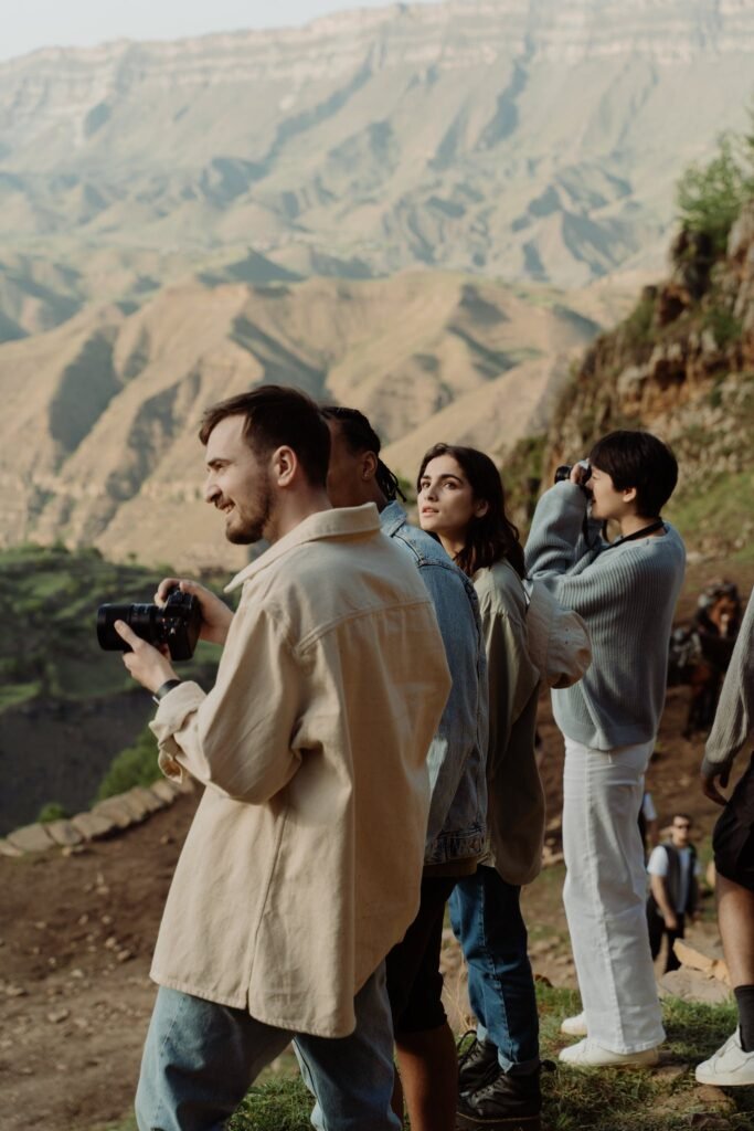 People Sightseeing On Mountains