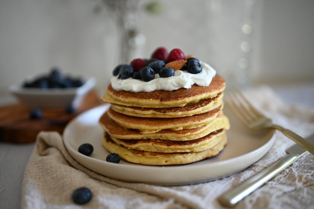 Pancakes with Fruits and Whipped Cream 