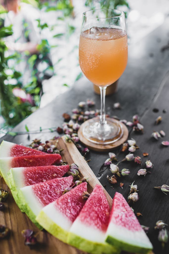 Watermelon pieces with fresh juice served on table